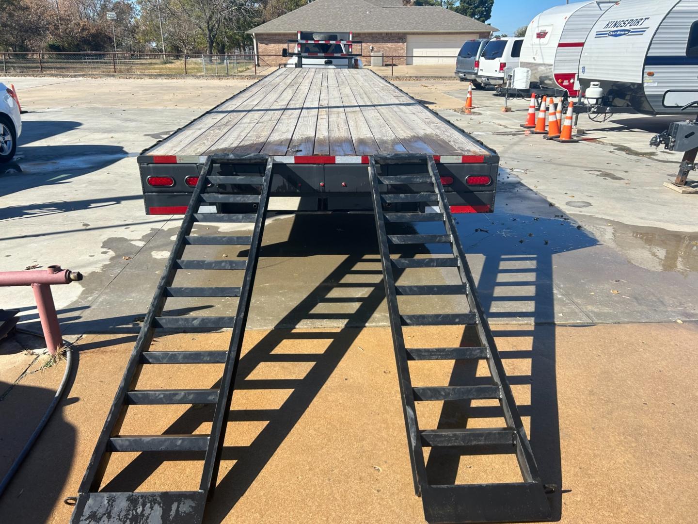 2022 BLACK CALTEX FLATBED (4C9GF4023NM) , located at 17760 Hwy 62, Morris, OK, 74445, 35.609104, -95.877060 - 2022 CALTEX FLATBED IS 40FT, GVWR 14,000, HEAVY DUTY SLIPPER SPRING SUSPENTION, ALL WHEEL ELECTRIC BRAKES ON ALL AXLES, 12' I-BEAM, FRONT LOCKING CHAIN BOX WITH LID, 8’ SLIDE IN RAMPS, DUAL 12,000 lb DROP LEG JACKS $8,500 CALL RUSS OR JONA AT 918-733-4887 - Photo#2